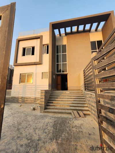 Twin house in a prime location on a high plateau overlooking Al Khamael Club