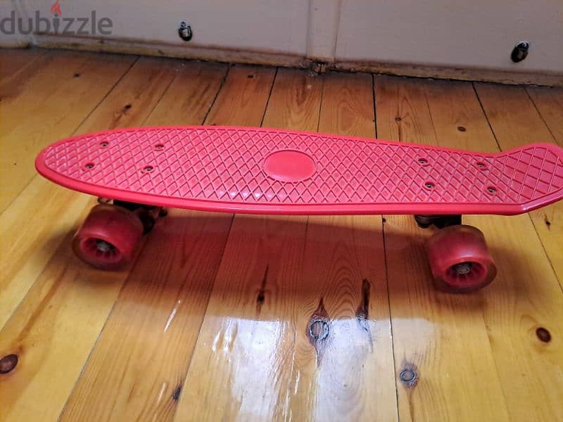 Penny red skateboard 0