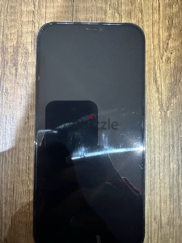 I phone 12 pro max same like new with his box and charger the original 0