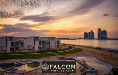 Townhouse corner with sea view and El Alamein Towers, immediate delivery and fully finished, near Rixos Hotel in New El Alamein