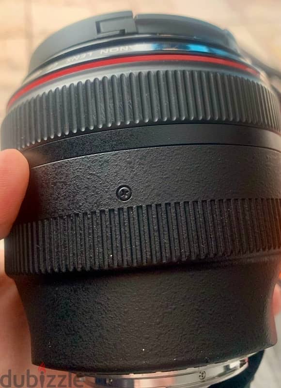 canon 85mm f/1.2 عدسة كانون ٨٥ 4