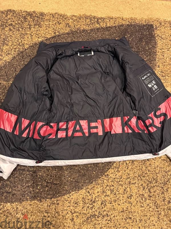 original MK puffer jacket size L width 63cm Used in good condition 0