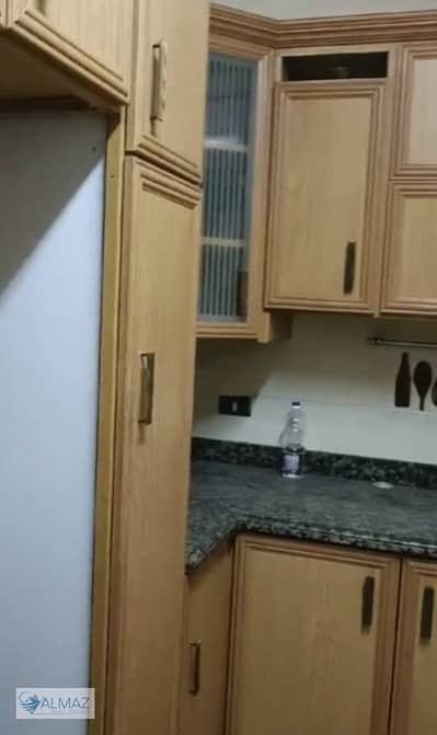 Apartment for rent with kitchen in El Banafseg Buildings in the First Settlement