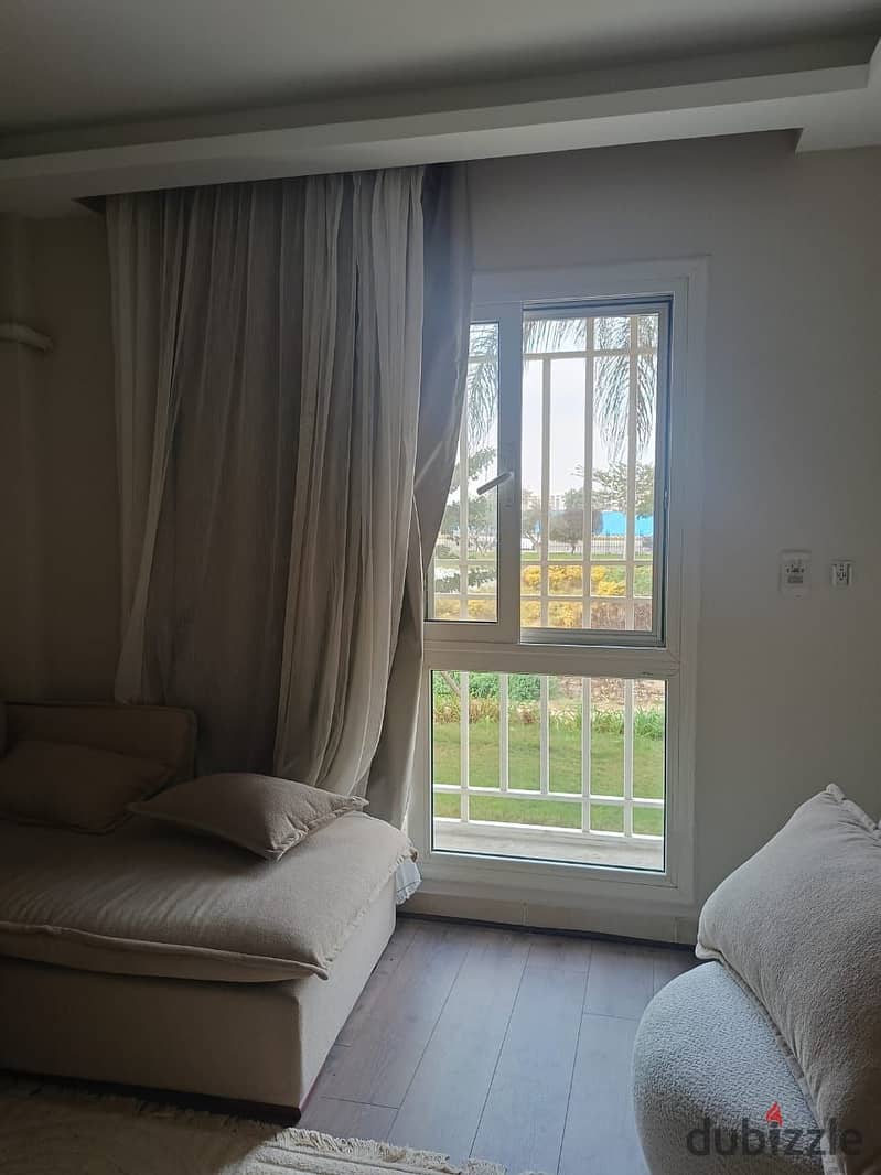 For sale in Madinaty, an excellent apartment, 106 square meters, ground floor, with a view of the torrent, in the best and most luxurious residential 0