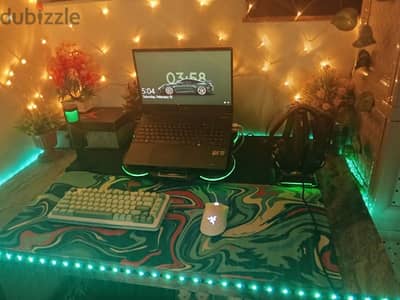 full gaming setup with an gaming laptop and all accessories