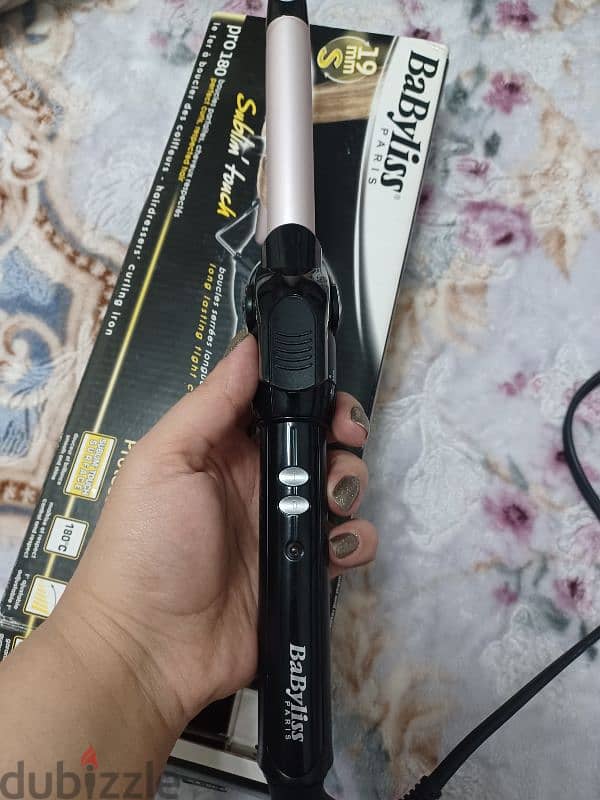 مكواة شعر كيرلي من براند babyliss بكرتونتها جربتها مره واحده فقط 1