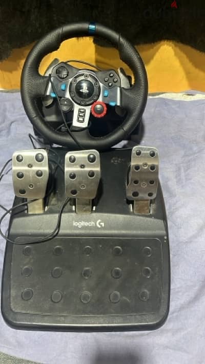 good condition steering wheel + pedals