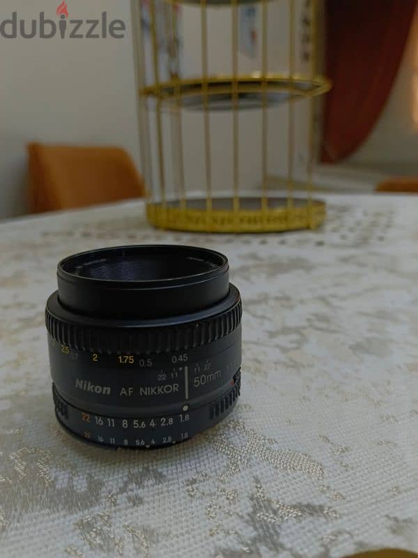 50 mm Nikon 1.8  نيكون ٥٠ مم عدسة 3