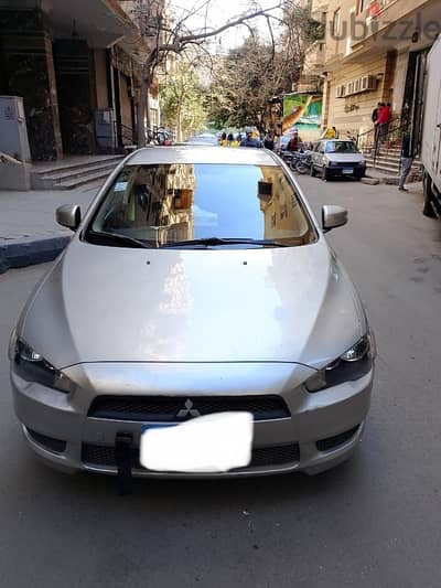 Mitsubishi Lancer 2015 - valid license 2.5 years حاله زيرو