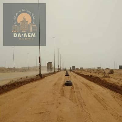 Land for sale in the second district, Beit Al Watan, facing an interval of 32 meters, full price, New Cairo