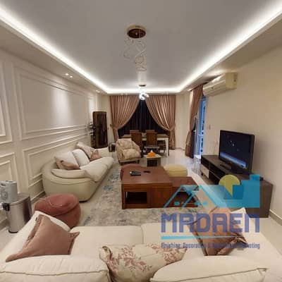 Wonderful ground floor apartment with garden 136 sqm + 80 sqm for sale in B10 Madinaty with furniture and appliances