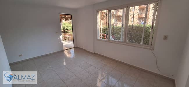 Apartment for rent in a garden in Al-Rehab group 82