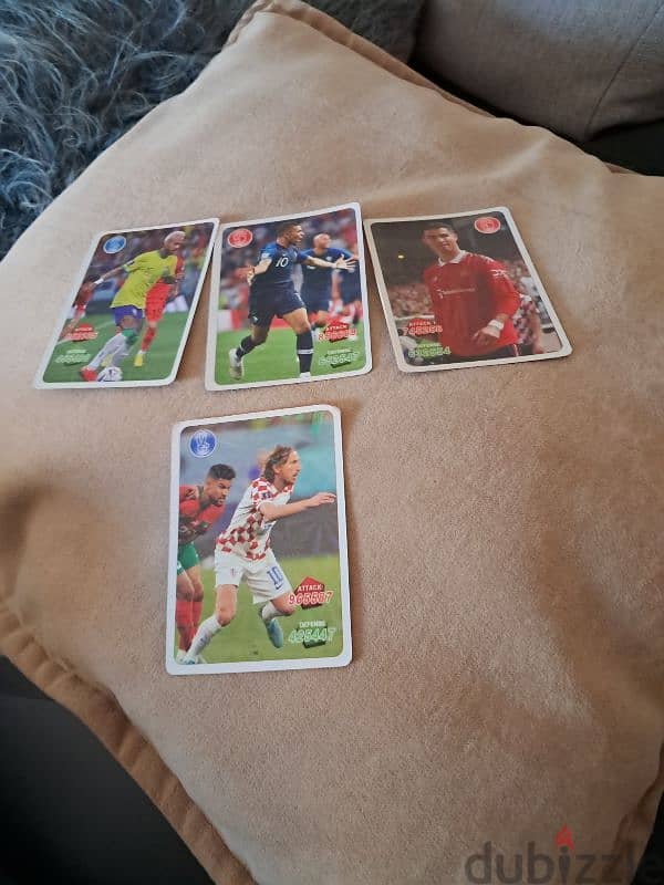 Newmarket, Ronaldo, Mbappe And Modric trading cards 0