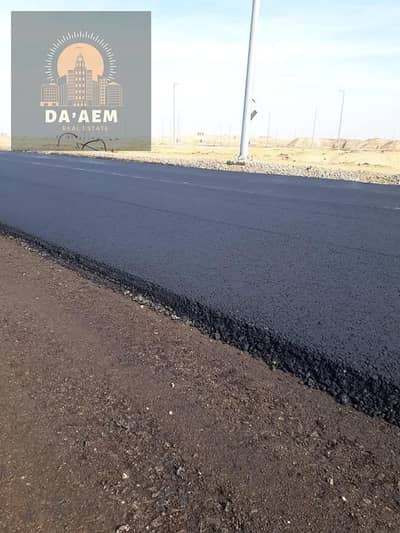 ارض للبيع في الحي السادس بيت الوطن بالقرب من منطقه الفيوزون  - القاهره الجديده