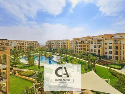 With a cash discount, own an apartment with a private garden , ready to move , in the heart of New Cairo - Stone Residence