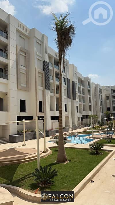 For sale, an apartment with hotel services, finished, with kitchen and air conditioners, in Prime Location, near Cairo Airport