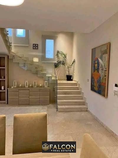 Stone Villa 253 m for sale with installments over 10 years in Telal East Compound, New Cairo, next to Palm Hills and Mountain View