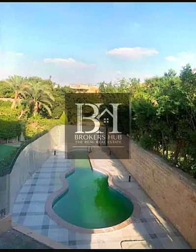 fully finished with Swimming pool Twin House for sale in Mena Residence Compound -New Cairo