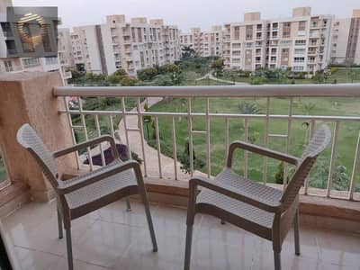 For sale, a 200-meter furnished apartment in Madinaty, with a wide garden view.