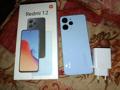 Redmi12  بقاله سنه بحاله جيده ومعاه باور بنك ١٠٠٠٠ امبير