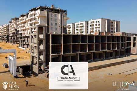 Own a 3-room apartment with a down payment of 390 K. with a private terrace in the New Capital next to the American University in Tag Misr _ De joya