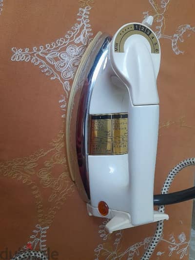 مكواة جافة يابانى وارد السعودية  DRY IRON