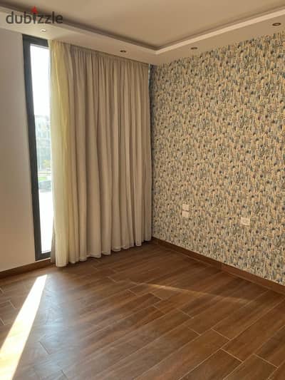 semi furnished Apartment with appliances rent Eastown new cairo