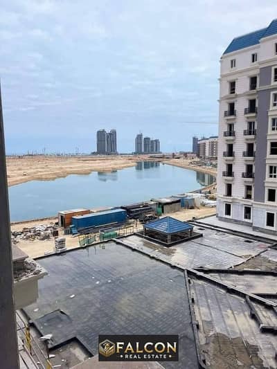 Apartment for sale with a view on the sea in the city of Alamein, ready to move, fully finished, next to the North Coast Marina, with facilities up to