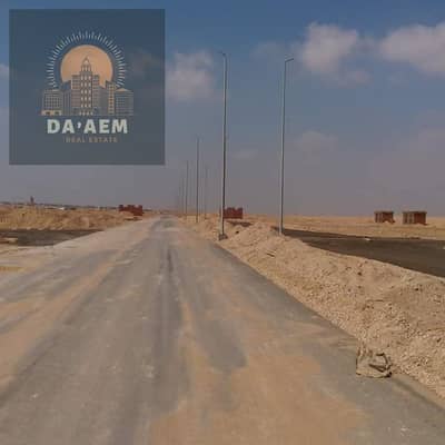 Land for sale in the first district, direct corner of Bahri, area of ​​830 square meters, pure price, New Cairo.