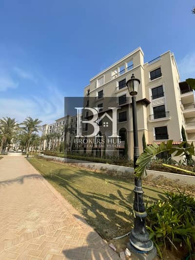 Fully finished with Acs Apartment with garden for sale in Village West Compound / Sheikh Zayed