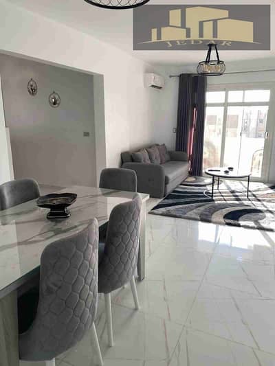 Furnished apartment for rent in Madinaty, 96 meters, special finishing, view garden, in front of the Kraft Zone