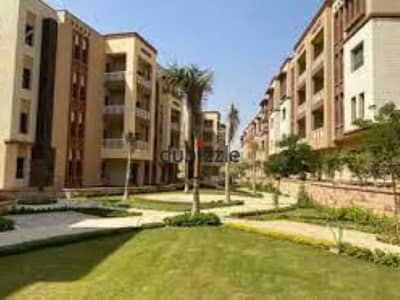 Ground floor apartment with garden for sale in Green 5th October Compound