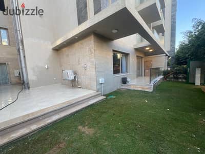 apartment with garden for sale in Gallaria moon vally new cairo prime location under market price