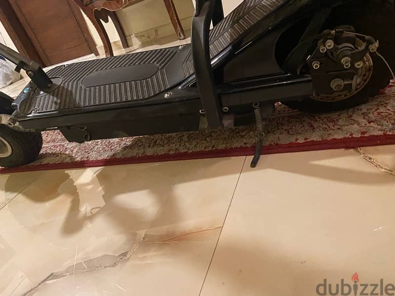 electric scooter with seat  سكوتر كهربائي بمقعد 2