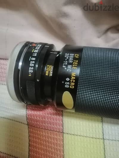 TAMRON zoom lens عدسة