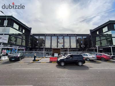 A shop in the heart of Shorouk City on Al Shabab Road in Town Center Mall