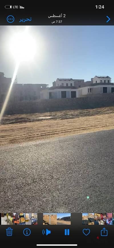 Land for sale in the Beit Al-Watan neighborhood, area of ​​704 square meters, for less than paid, facing the sea, corner of the corridor on the main s