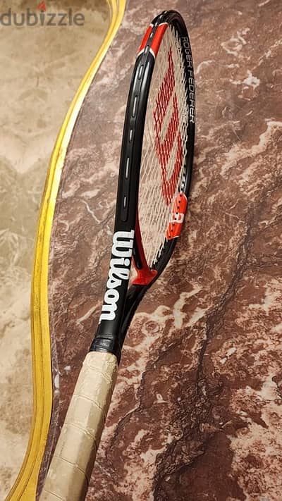 Willson tennis racket.