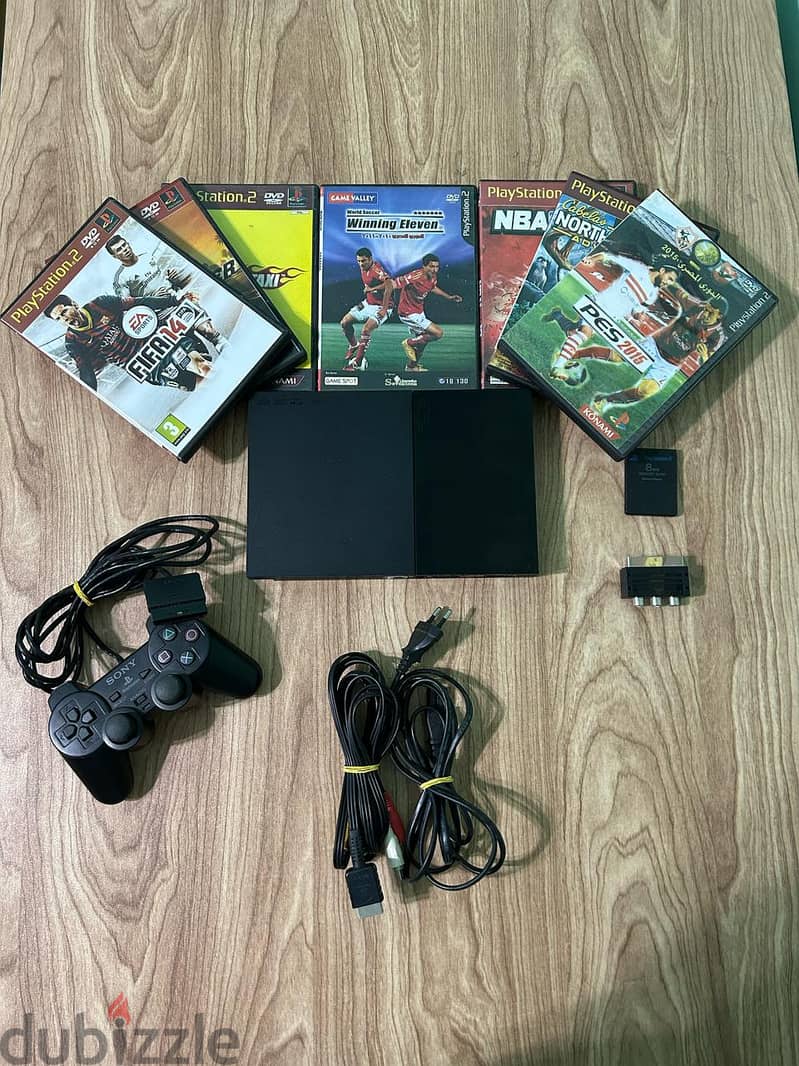 PlayStation 2 – 7 Free Games + PlayStation Arm 0