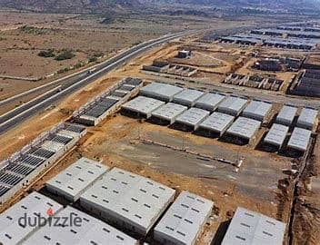 Land warehouse truss stores 5000 meters corner intersection for sale second industrial zone near major car agencies, factories and stores