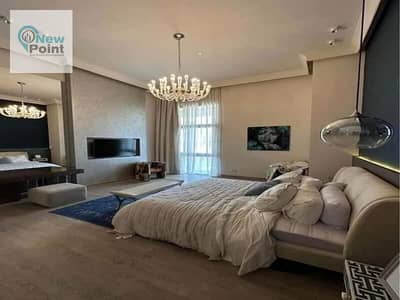 Apartment with garden beside Madinaty for sale in Sarai Compound in New Cairo