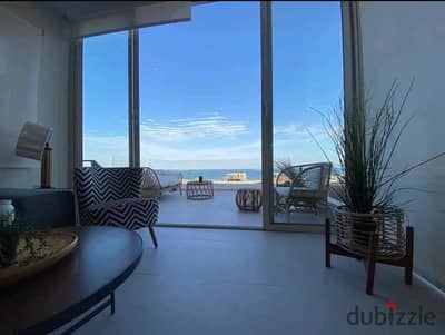 For sale, fully finished, sea view apartment on the sea + air conditioners + kitchen, in Silver Sands, North Coast, next to Sidi Heneish