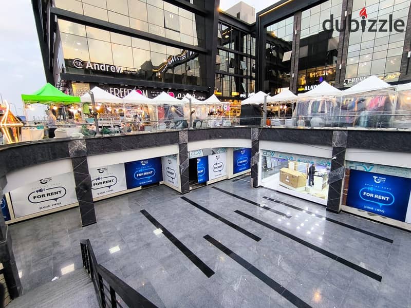 Commercial shop for sale, immediate delivery, rented for 51,500 per month, in the most famous mall in El Shorouk, TOWN CENTER 0