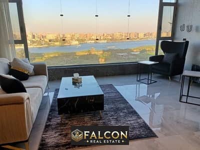 For sale, a furnished apartment with appliances, first row directly on the Nile, immediate delivery in Maadi (prime location), finished with air condi