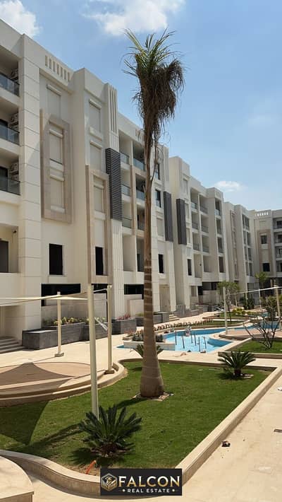 Hotel apartment for sale in El Jar Valori, next to Almaza City Center, finished, with air conditioners and kitchen