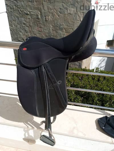 European saddle, with stirrups and girth