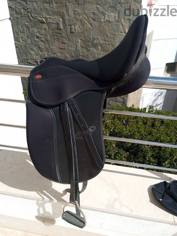 European saddle, with stirrups and girth 0