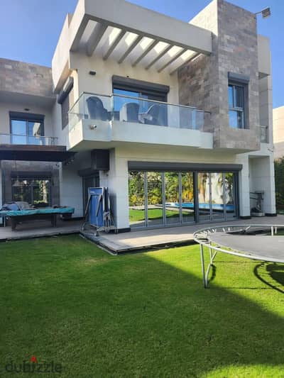 Spacious Villa with Private Garden in a Prime Location, Directly on 26th Axis, in Front of Arkan