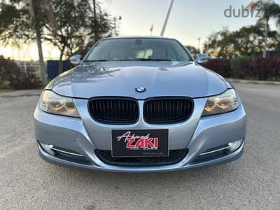 BMW 320i (2010) Face-Left