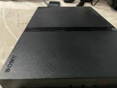 PS2 console with controller